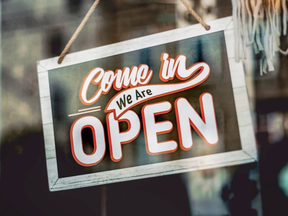 Mesa small business owners reviewing insurance plans—protect your company with essential business coverage. Get a free consultation today!